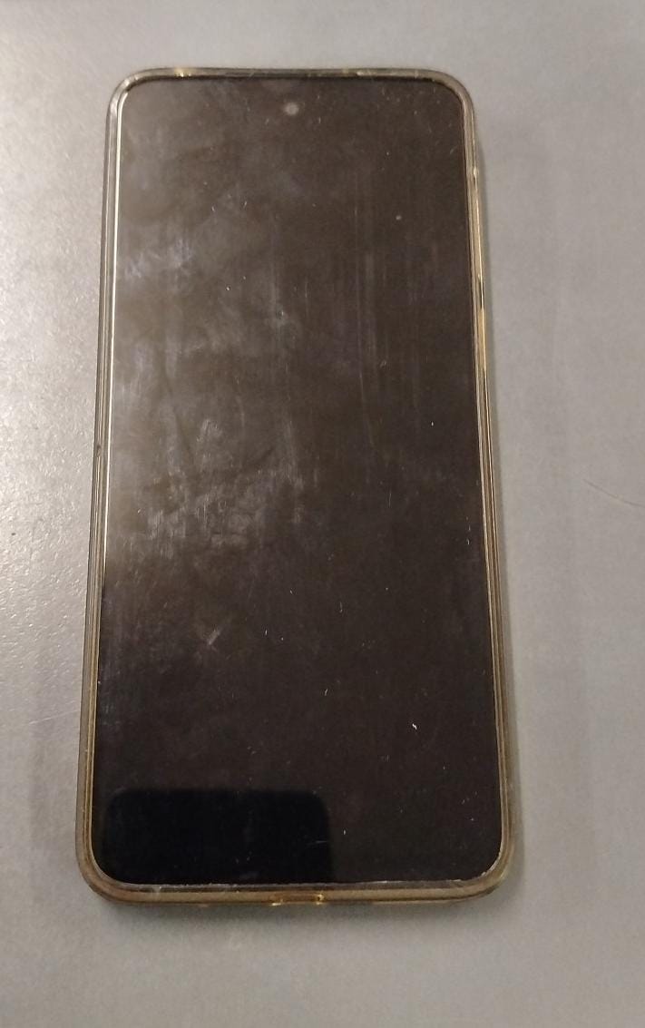 UN (01) TELEFONO CELULAR, MARCA MOTOROLA, MODELO G23, COLOR CELESTE METALIZADO, EL CUAL POSEE UNA FUNDA DE COLOR TRANSPARENTE.-