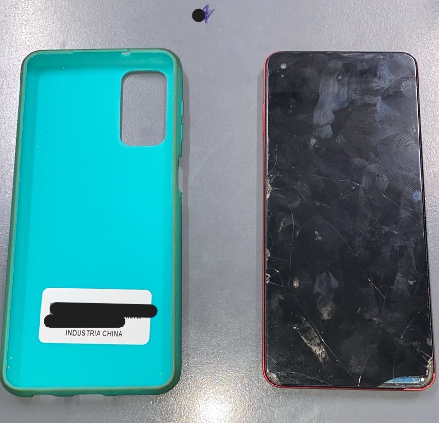 UN TELEFONO CELULAR MARCA SAMSUNG, COLOR ROJO.